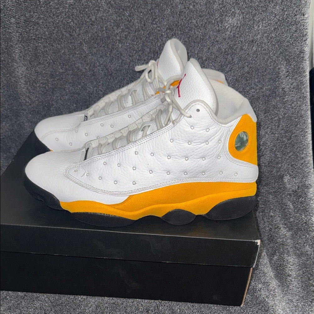 Jordan White and Yellow High-Top Basketball Sneakers